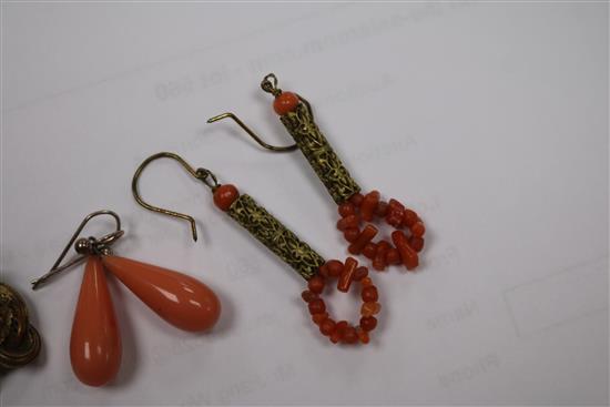A mixed group of coral items including necklaces, brooch and earrings.